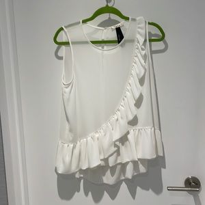 Show off  your tan with this super fem tank! Ruffle details around hem & front.